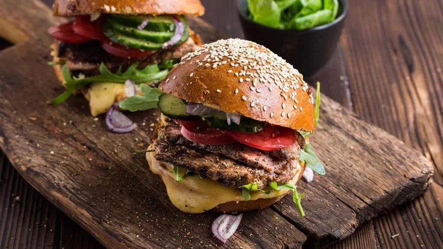 Beef steakburgers with garlic and tomato butter